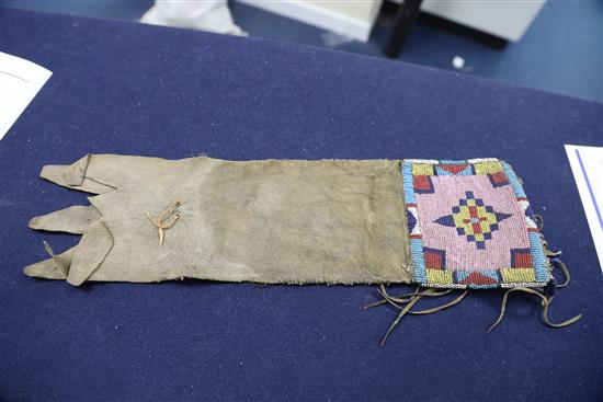 A Native American buckskin and beadwork gauntlet, Northern Plains, 19th century, Approx 45cm